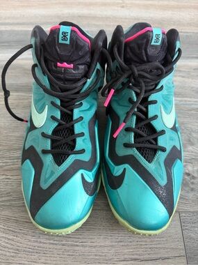 Nike LeBron 11 sneakers in the vibrant "South Beach" colorway size 6.5